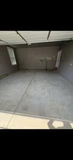 Bare concrete garage floor before epoxy coating
